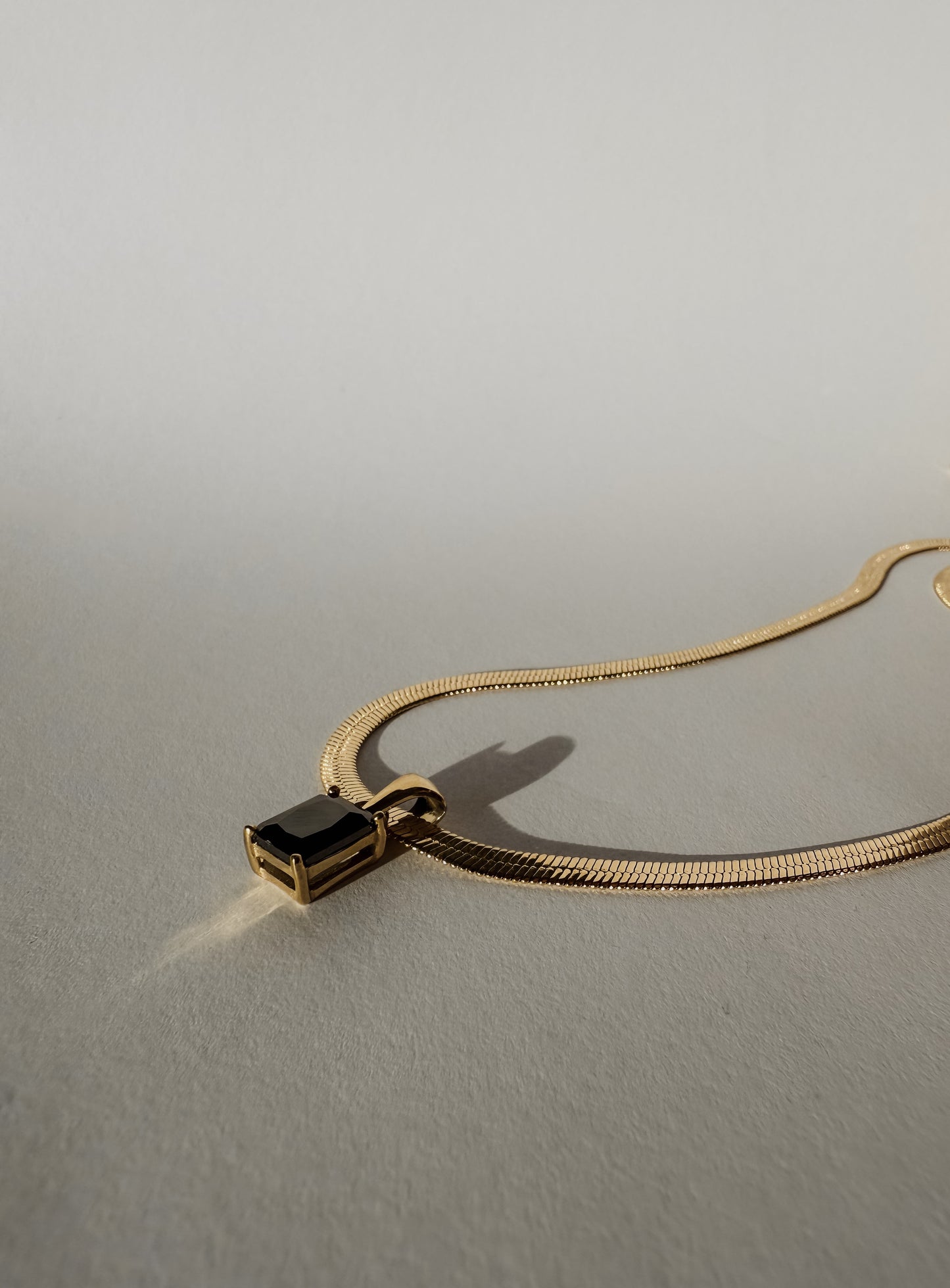Onyx Snake Necklace - Gold